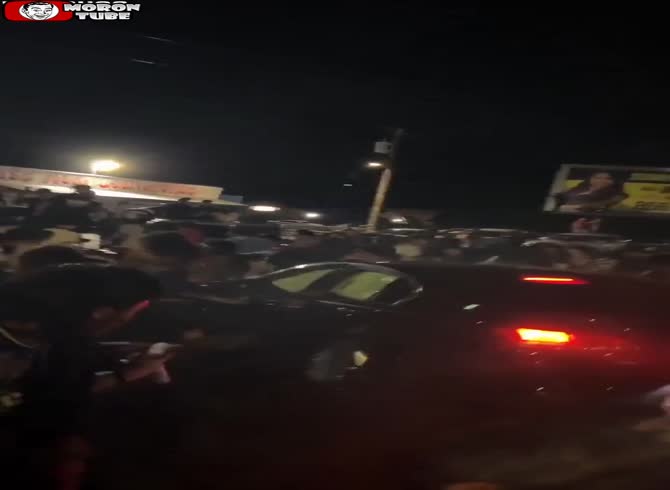 Video :At an unlawful rally, a car crashes into the crowd